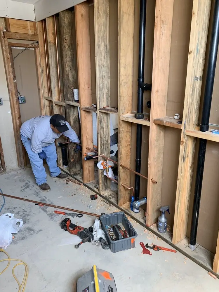 Commercial rough-in plumbing for Water Heater Replacement in Lewisville